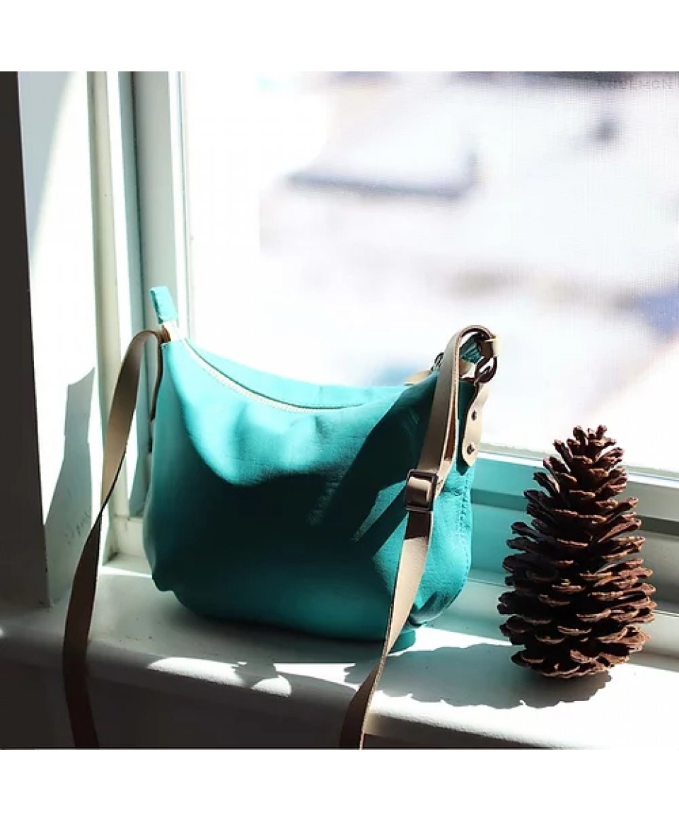 Borla. Turquoise teal crossbody bag