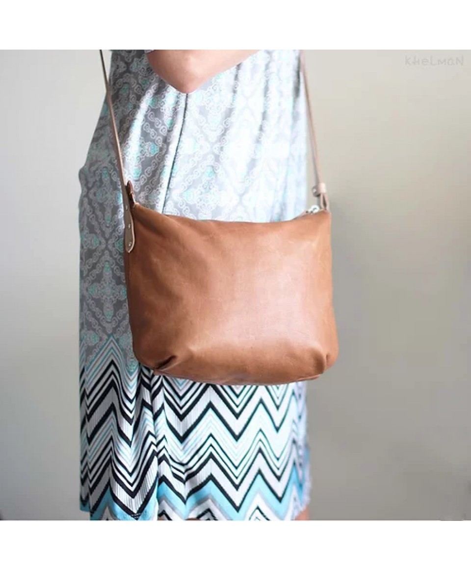 Borla. Tan wood lamb crossbody purse