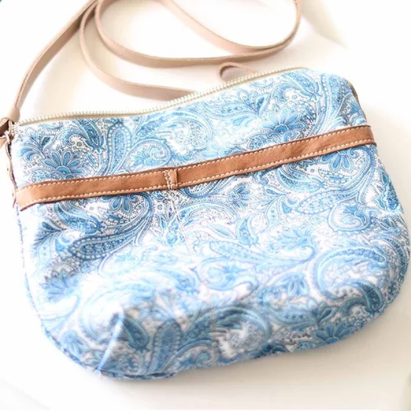 Borla. Tan wood lamb crossbody purse