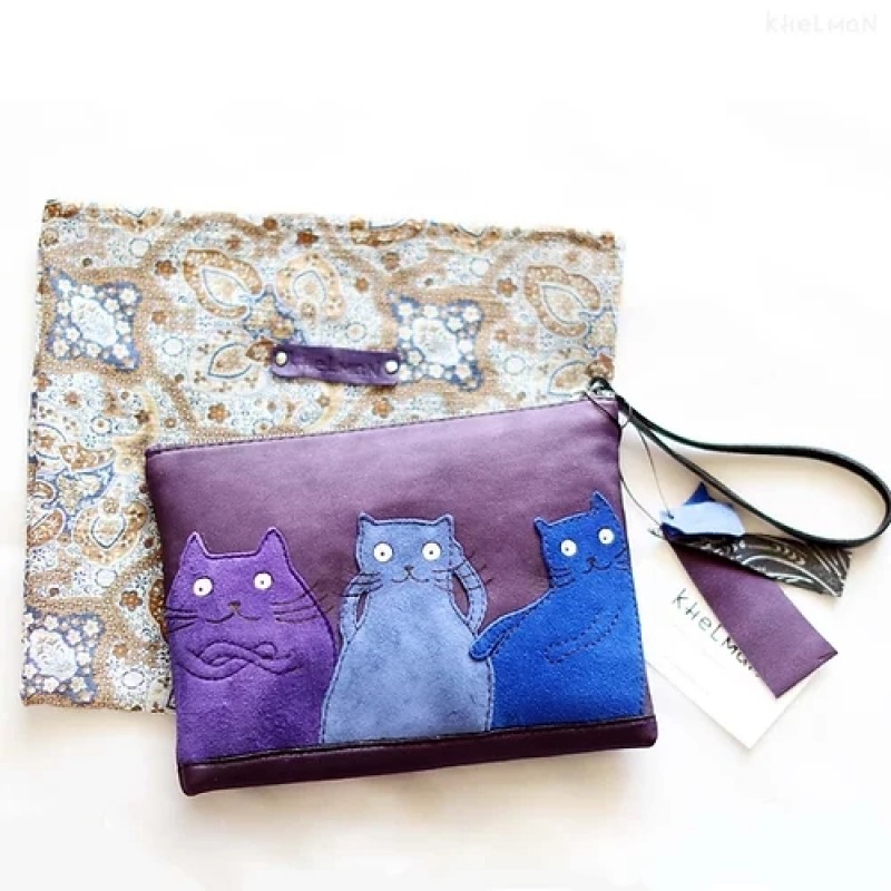 Suede Cats. Leather clutch