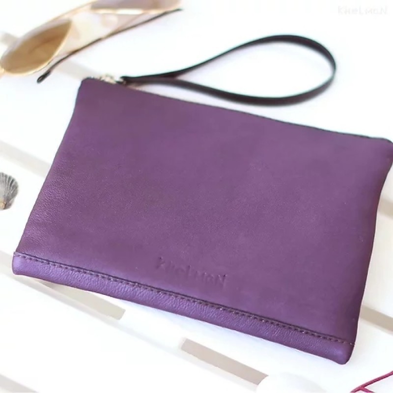 Suede Cats. Leather clutch