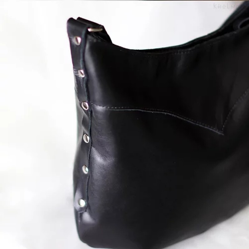 Demilune. Black leather crossbody bag