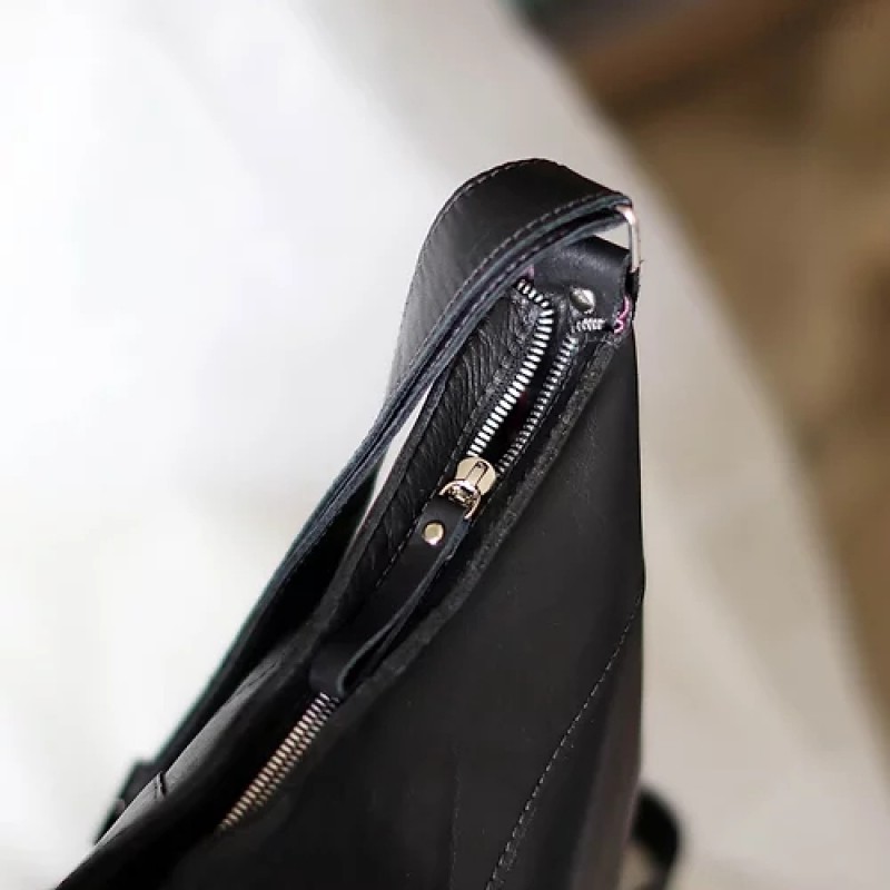 Demilune. Black leather crossbody bag